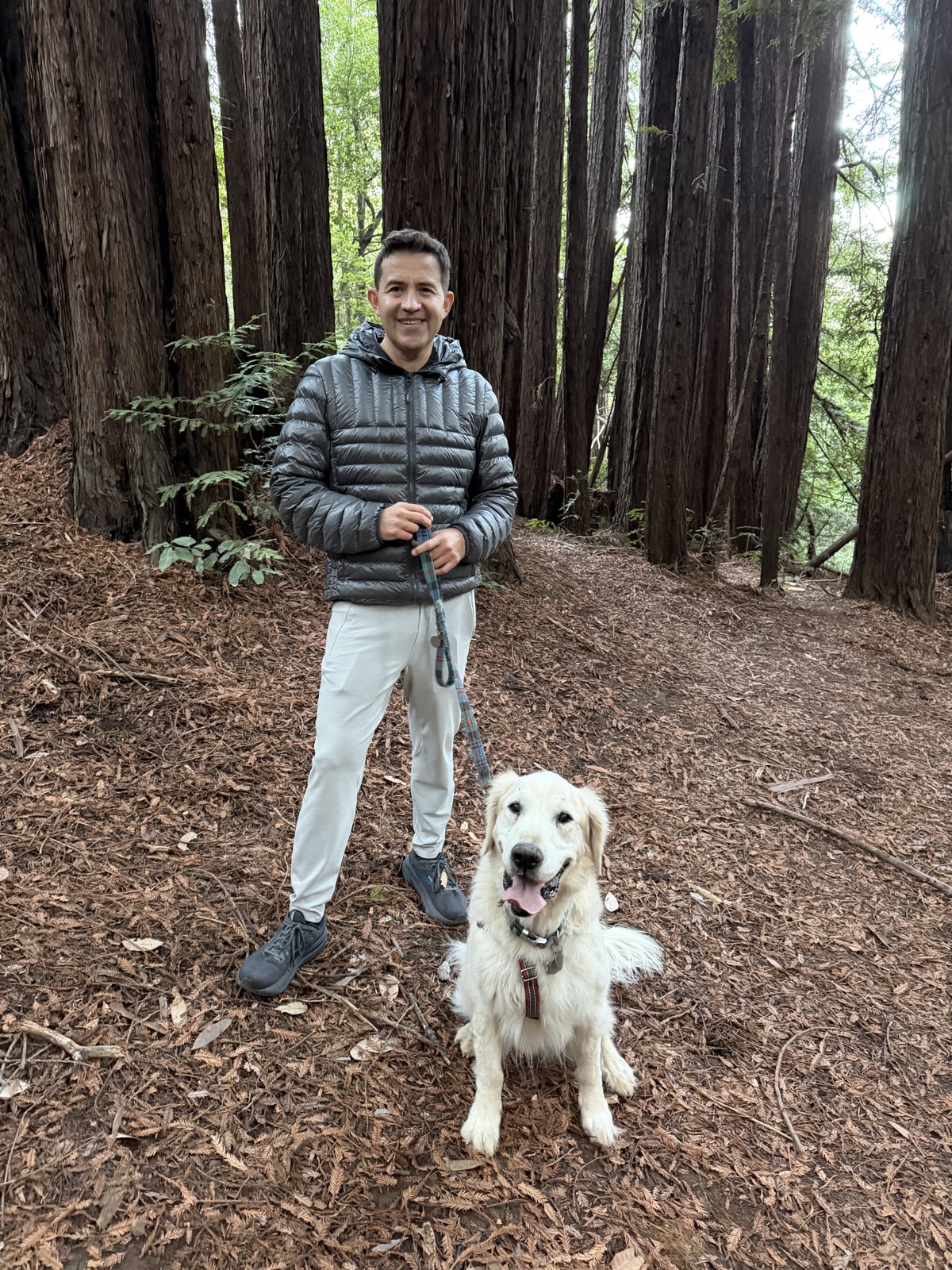 Sergio Béjar López with Winston among the redwoods